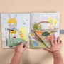Розвиваюча іграшка Taf Toys Розвивальна книжка Бізібук зайченятка (13355)